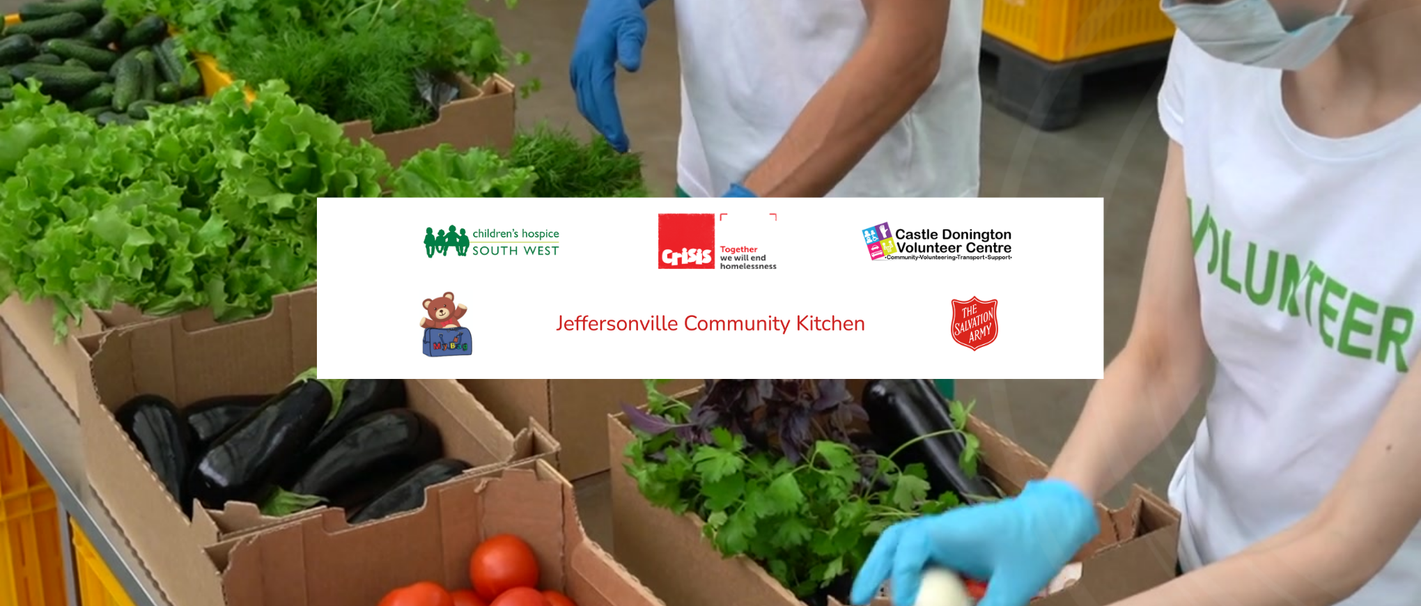 volunteers sorting boxes of food